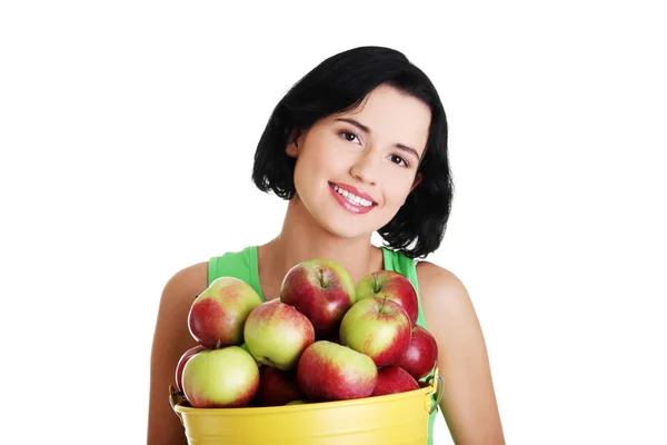 Mulher sorridente com maçãs — Fotografia de Stock