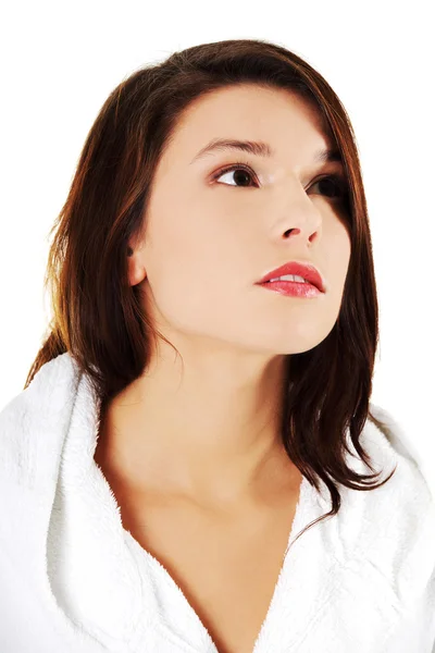 Young beautiful woman in bathrobe — Stock Photo, Image