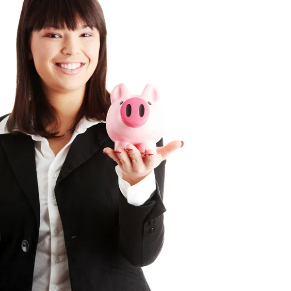 Vrouw bedrijf piggy bank — Stockfoto