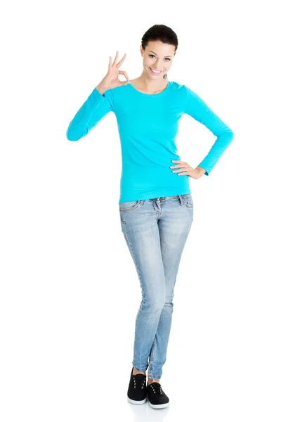Beautiful success woman giving perfect gesture — Stock Photo, Image