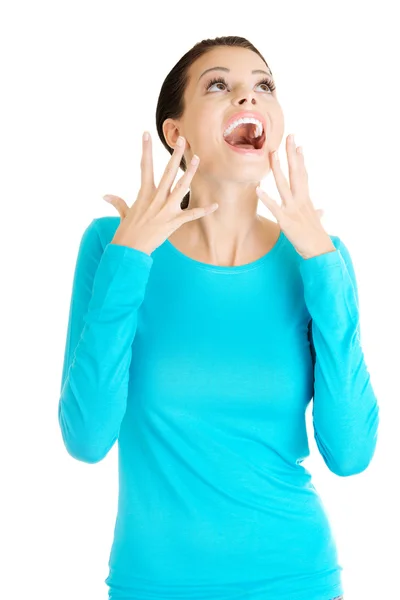 Shocked and excited woman looking up — Stock Photo, Image