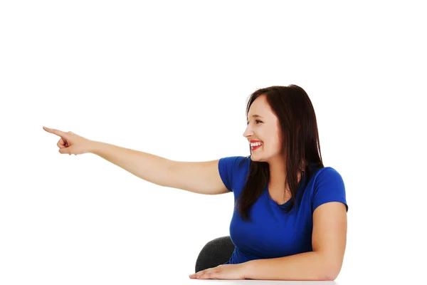 Woman pointing — Stock Photo, Image