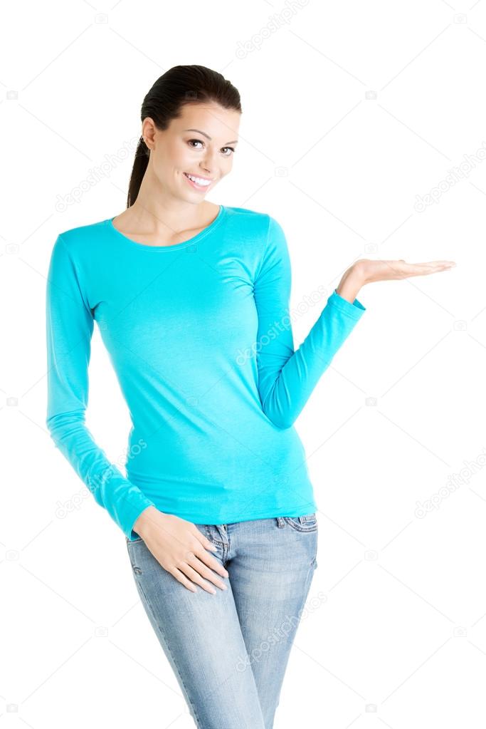 Woman presenting copy space on her palm