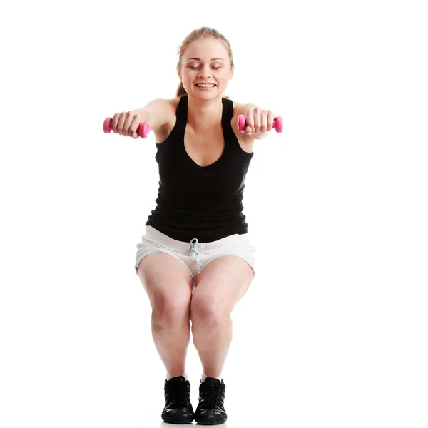 Beautiful young blonde exercising — Stock Photo, Image