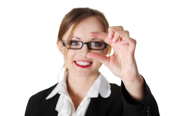 Businesswoman holding something abstract — Stock Photo, Image