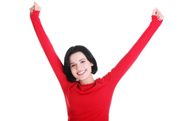 Excited young woman with fists up — Stock Photo, Image