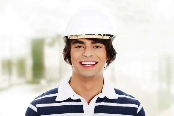 Hombre en casco blanco — Foto de Stock