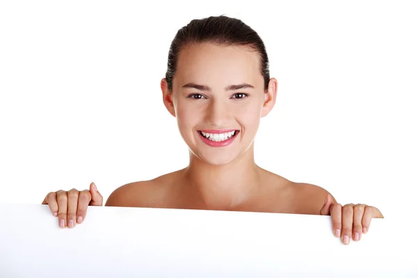 Girl holding blank board. — Stock Photo, Image