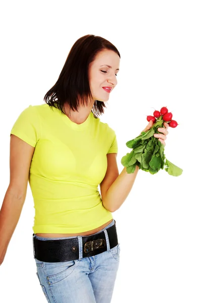 Woman holding radishes — Stock Photo, Image