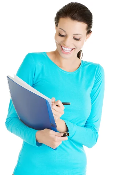 Mujer estudiante feliz con cuaderno —  Fotos de Stock