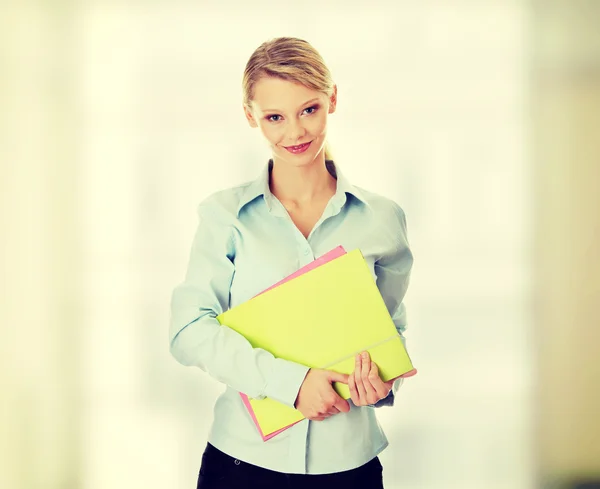 Woman holding folder — Stock Photo, Image