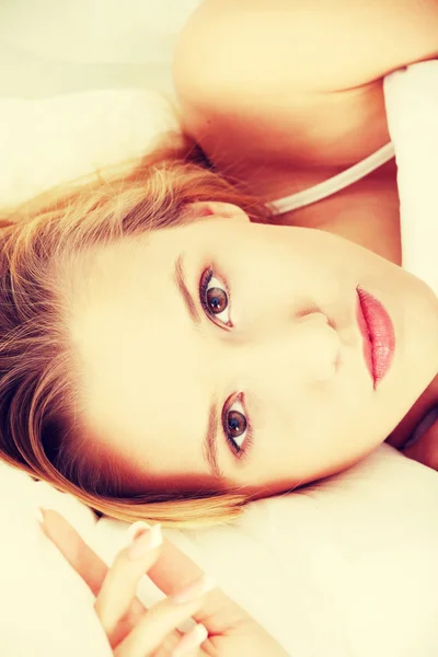 Woman on bed — Stock Photo, Image