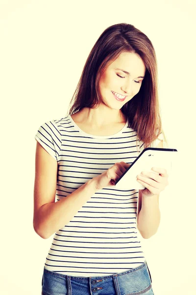 Happy caucasian teen with tablet — Stock Photo, Image