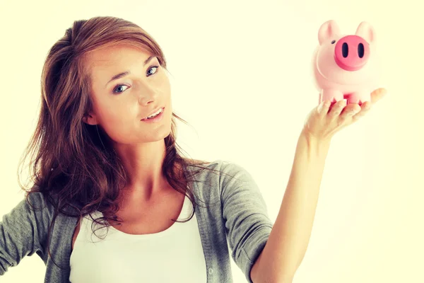 Mulher com banco porquinho — Fotografia de Stock