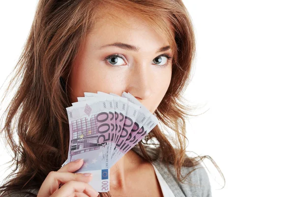 Šťastná mladá žena držící peníze — Stock fotografie