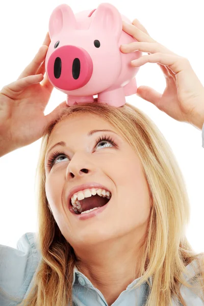 Businesswoman holding piggy bank — Stock Photo, Image