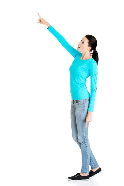 Mulher apontando no espaço de cópia — Fotografia de Stock