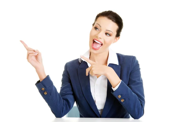 Businesswoman pointing on empty copy space — Stock Photo, Image