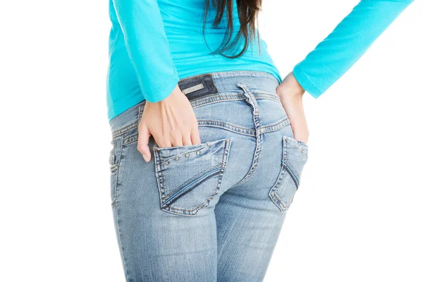 Ajuste trasero femenino en jeans —  Fotos de Stock