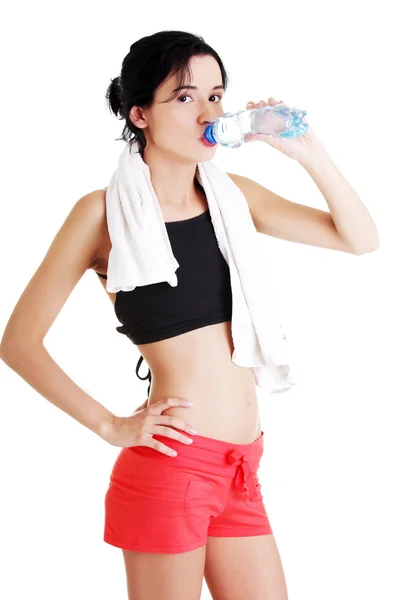 Mujer bebiendo agua mineral —  Fotos de Stock