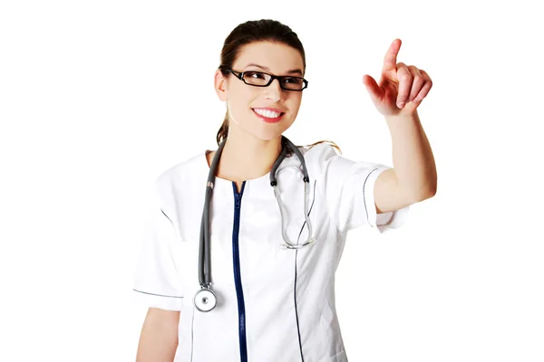 Doctor pointing something on abstract screen Royalty Free Stock Photos