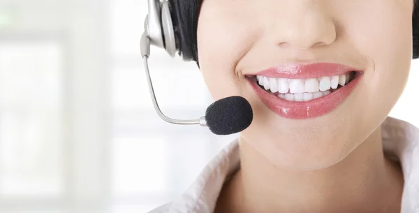 Callcenter assistent glimlachen — Stockfoto