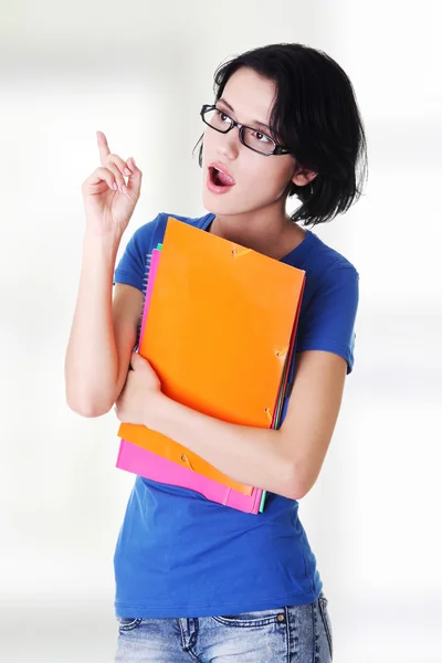 Studentin zeigt nach oben. — Stockfoto