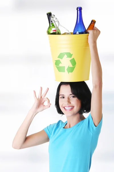 Woman holding recycling basket — Stock Photo, Image