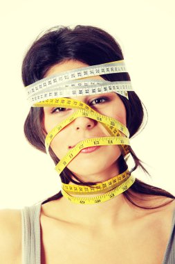 kadın kafasını etrafında bant ölçme ile