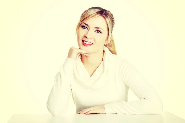 Woman sitting at the desk — Stock Photo, Image