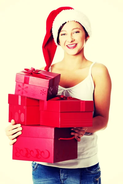 Teen girl holding gifts. — Stock Photo, Image