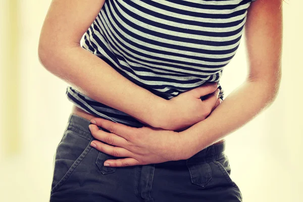 Woman with stomach issues — Stock Photo, Image