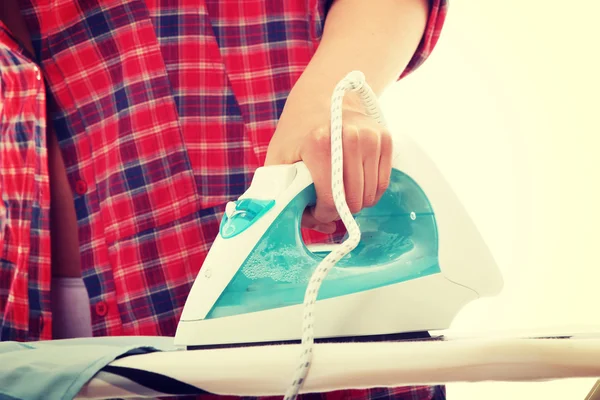 Young woman ironing — Stock Photo, Image