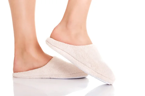 Feet with white slippers. — Stock Photo, Image