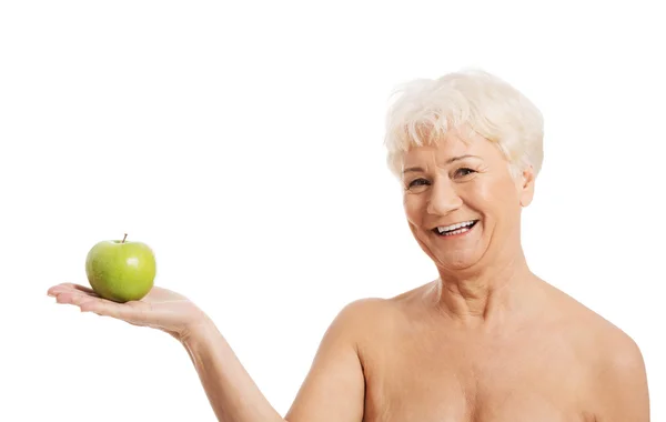 Kobieta trzyma i jabłko — Zdjęcie stockowe