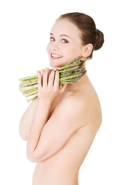 Vrouw met asperges — Stockfoto