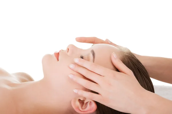 Relaxed woman enjoy receiving face massage — Stock Photo, Image