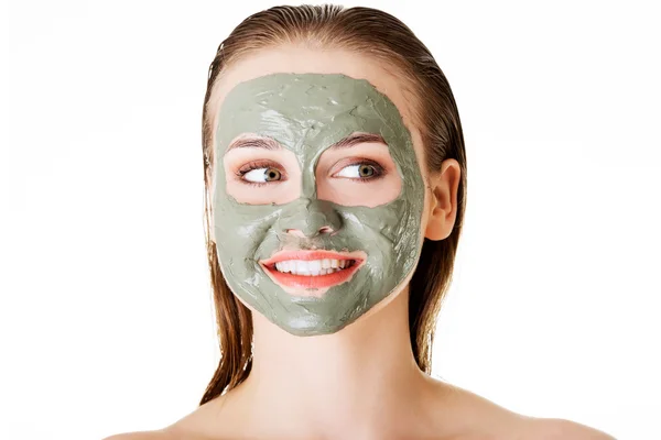 Woman with clay facial mask — Stock Photo, Image