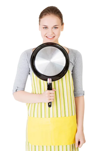 Lachende vrouw met de koekenpan — Stockfoto