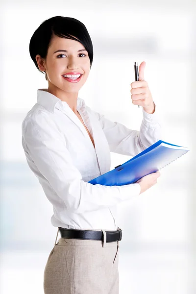 Woman gesturing thumb up — Stock Photo, Image