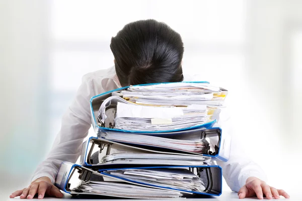 To much work to do. Sad woman with ringbinders — Stock Photo, Image