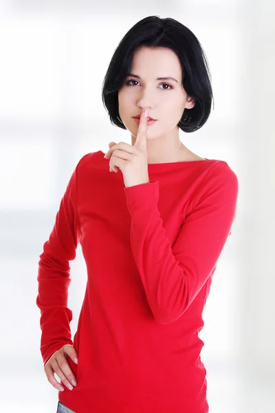 Kvinnan att göra en hålla det tysta gest — Stockfoto