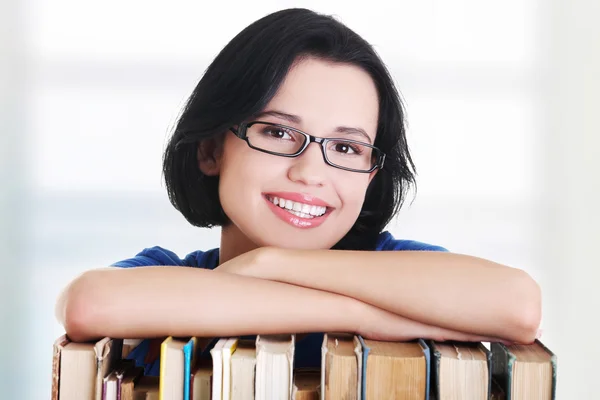 Happy smiling young student woman with books — Stock Photo, Image