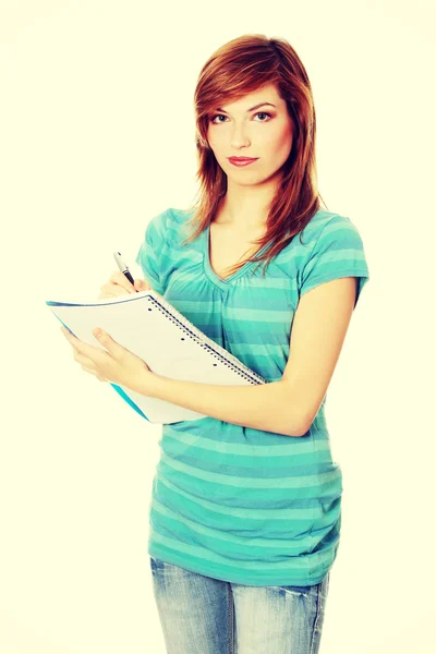 Teen student with notepad — Stock Photo, Image