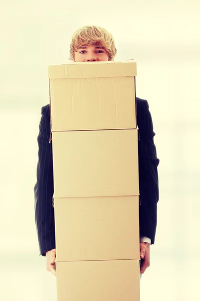 Businessman with stacked Boxes — Stock Photo, Image