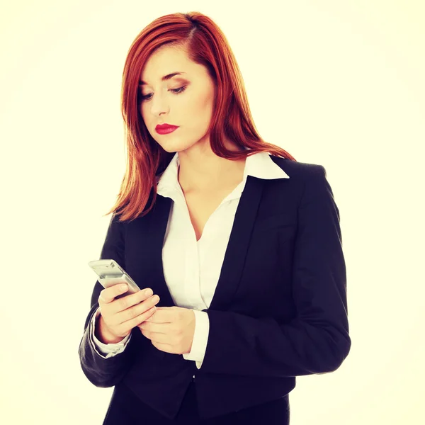 Бізнес-леді з мобільним телефоном — стокове фото