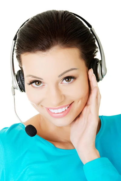 Assistente de call center sorrindo — Fotografia de Stock