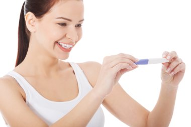 Hamilelik testi olan kadın.