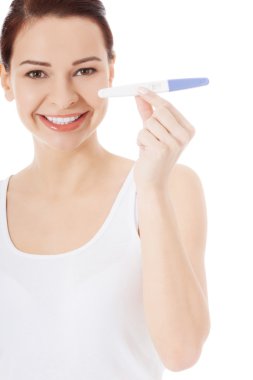 Hamilelik testi olan kadın.