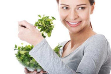 güzel kadını marul yiyor.